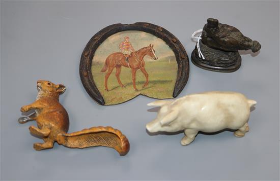 A Cain, a small bronze cockerel, a pottery pig, a horseshoe trophy and a spelter squirrel